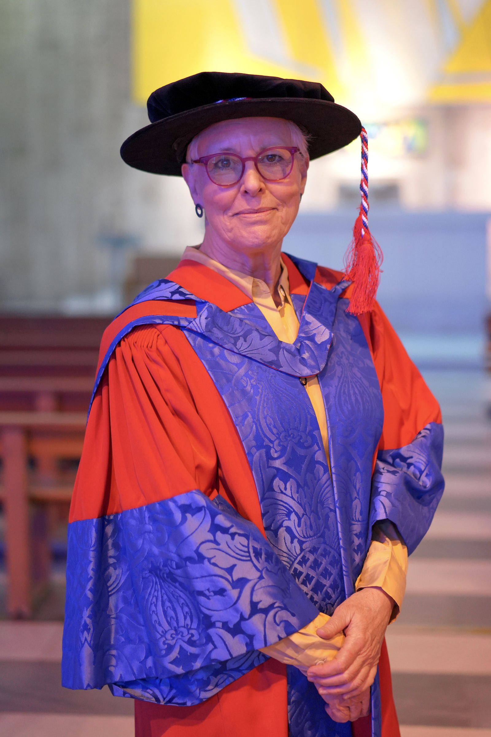 Rita Gardner in gown to receive honorary doctorate