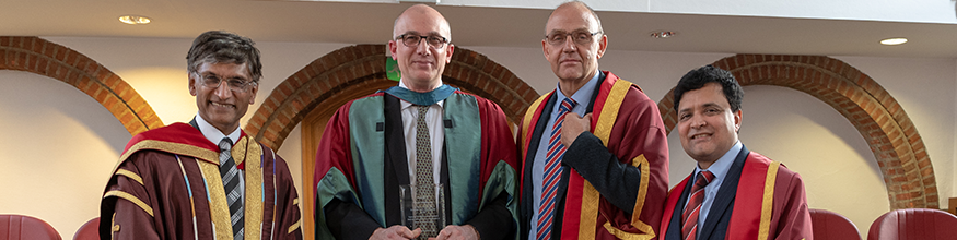 professor in gown at inaugural lecture