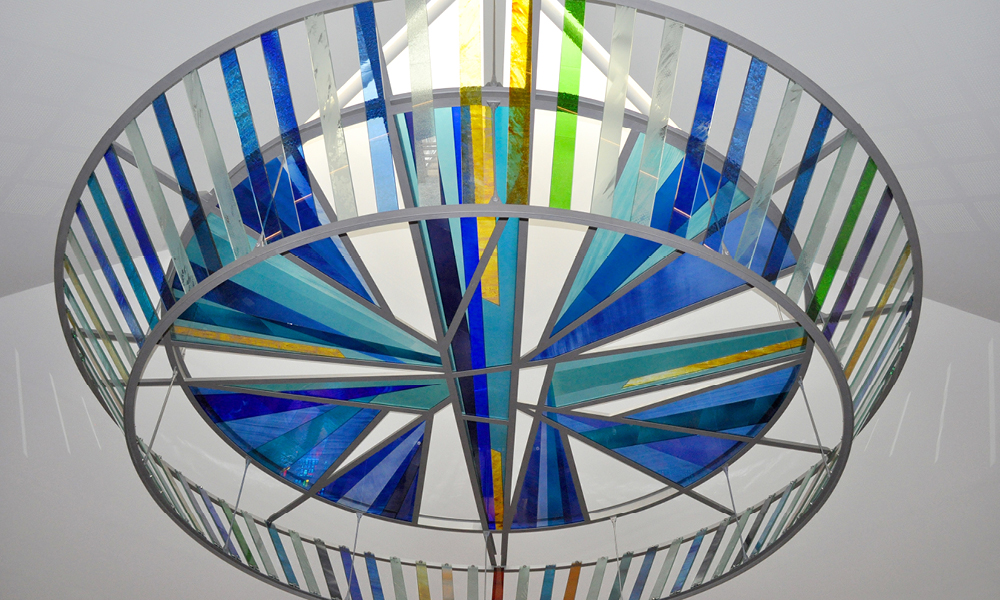 Image of stained glass display inside the Chapel at Hope Park.