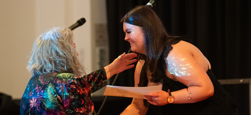 Staff member receiving an award