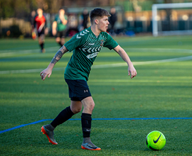 Student playing football for university team