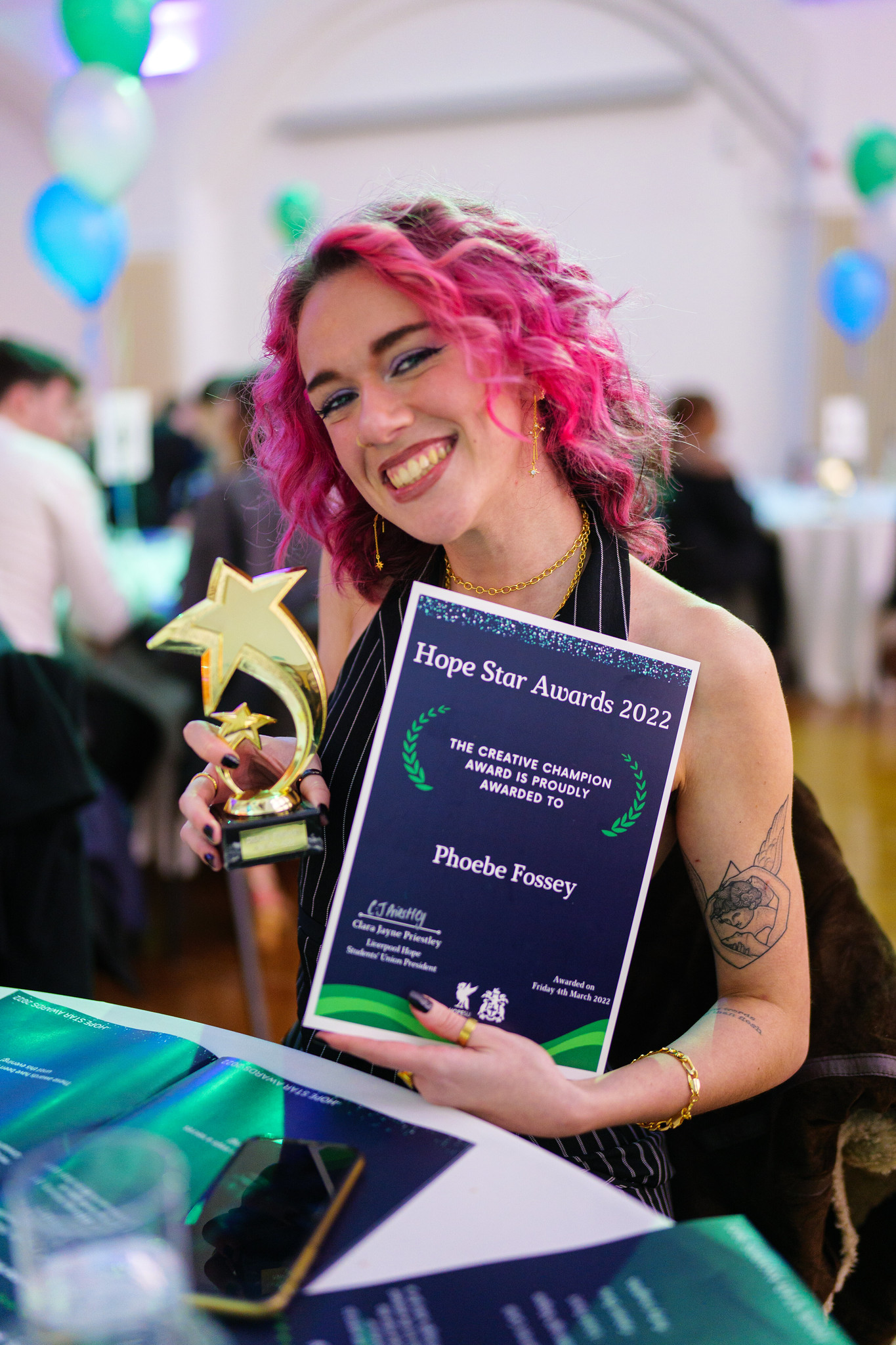 Phoebe Fossey with her award