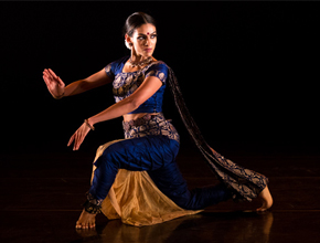 dancer mid dance with black background