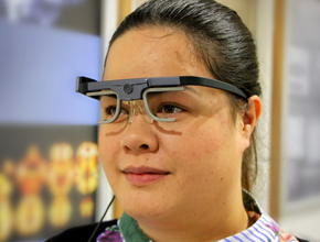 Psychology academic wearing specialised glasses