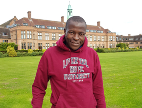 Student wearing Hope hoodie posing for a photo