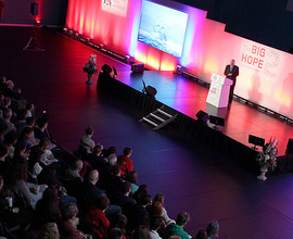 image of keynote speaker on stage