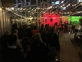 Room filled with people for drama event