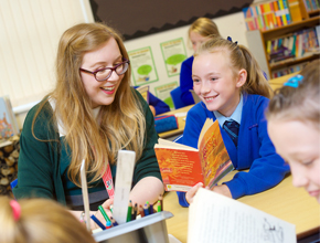 student teacher working with pupil