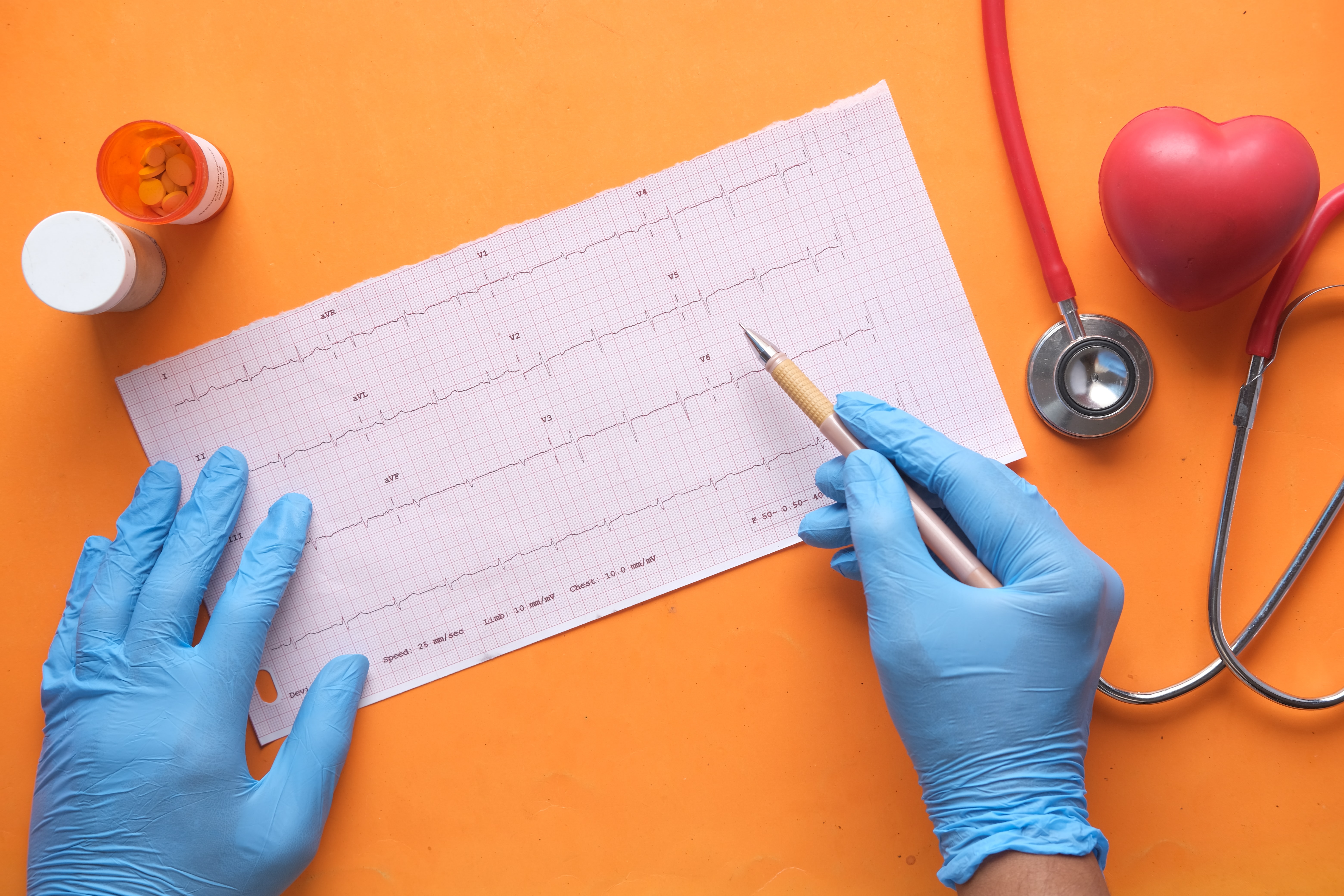 doctor looking at patient's heart stats