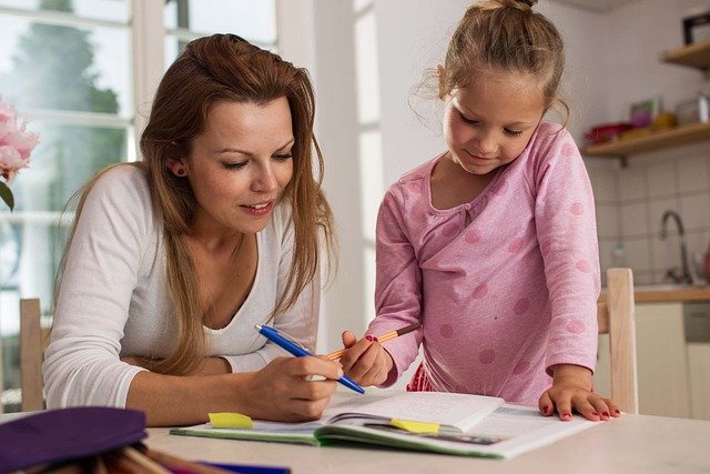 woman reading with child